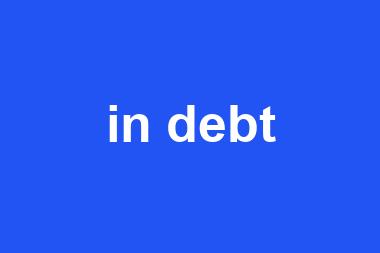 in debt